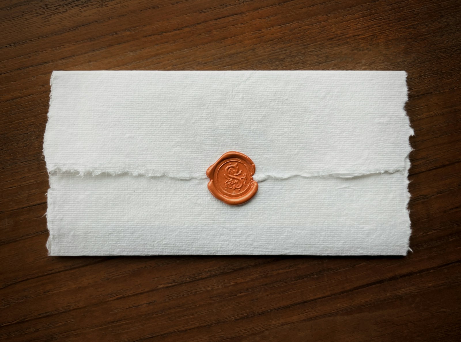 A wax seal on handmade paper