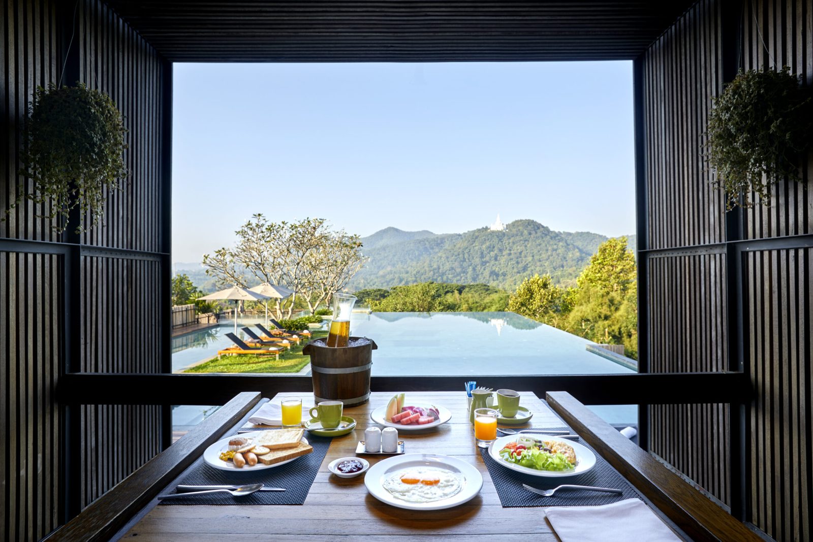 Breakfast looking out over the infinity pool and the mountains