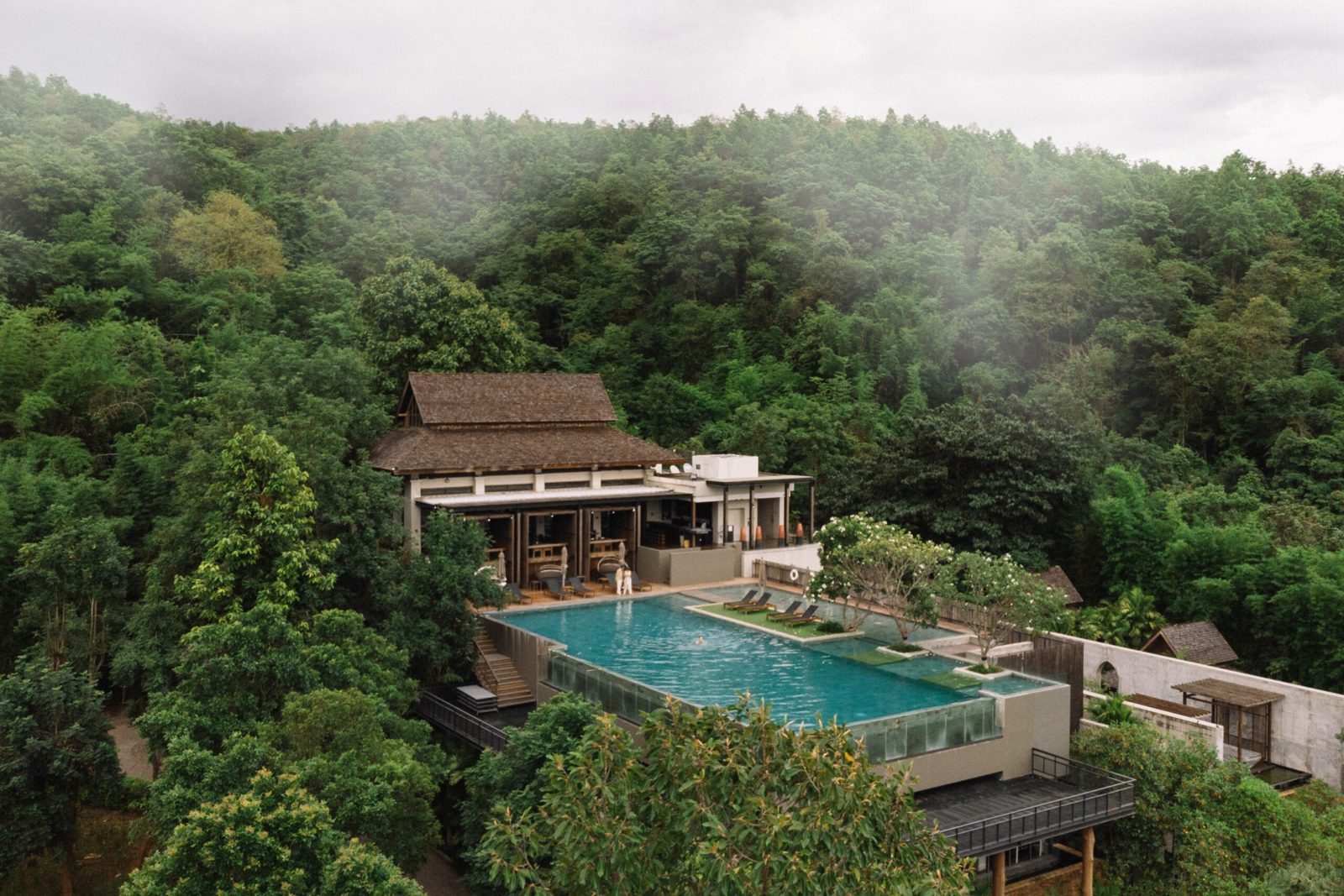 The resort on its hillside in the forest