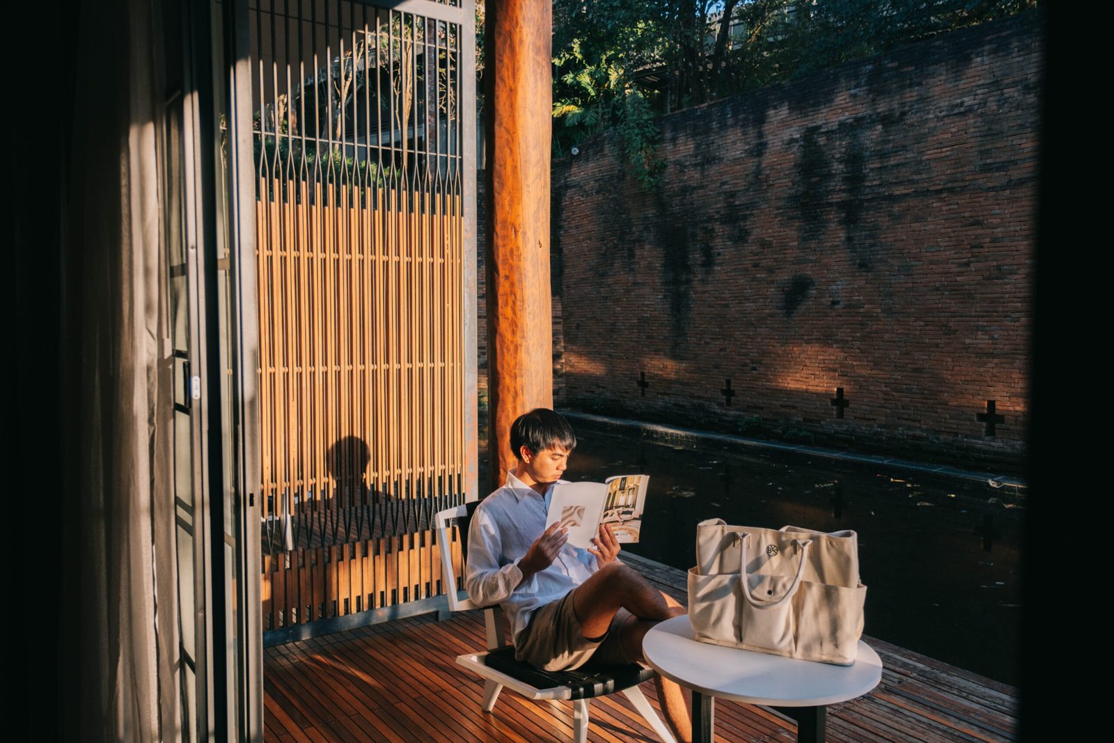 Reading on a private terrace among the trees