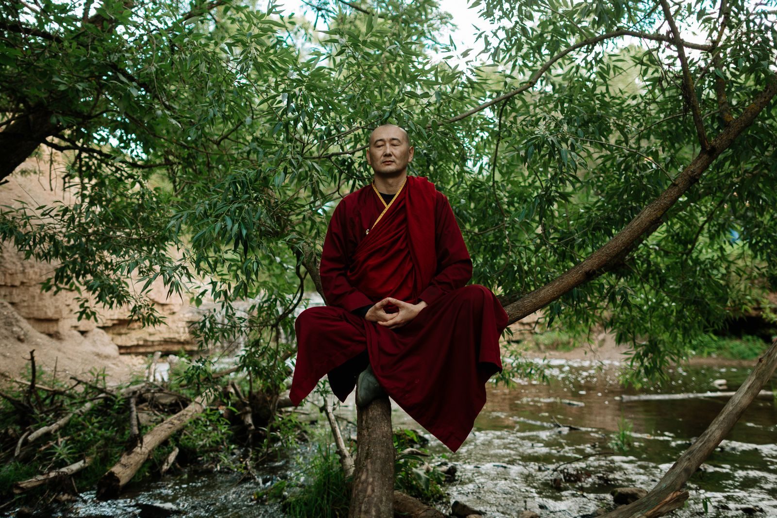 A monk sitting in the forest